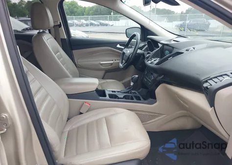 2017 Ford Escape Titanium z USA, uszkodzony, nr VIN 1FMCU0J93HUB64809